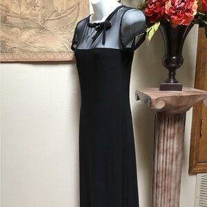 BLACK MIDDY DRESS BY LEONA EDMISTON. Round neckline with tie and sheer, Size 1